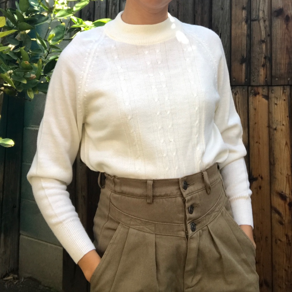 White cable knit mock neck sweater